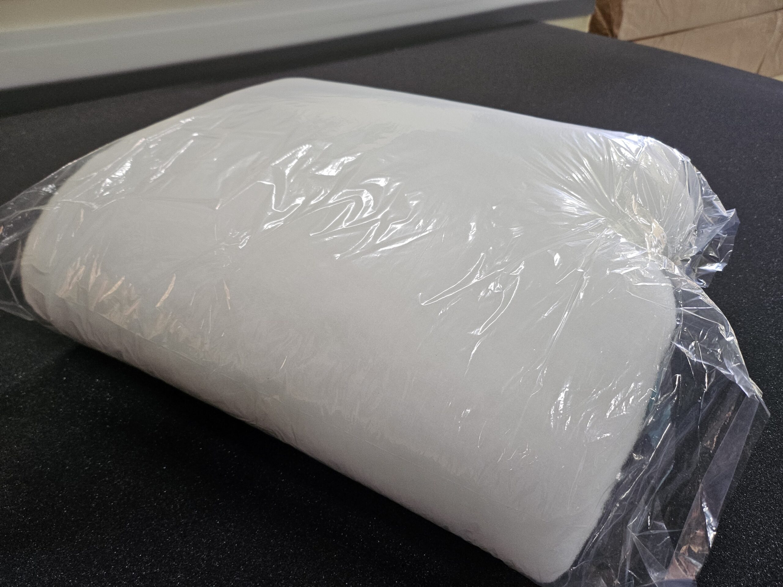 メーター売りの樹脂綿をコンパクトに透明袋へ梱包した写真